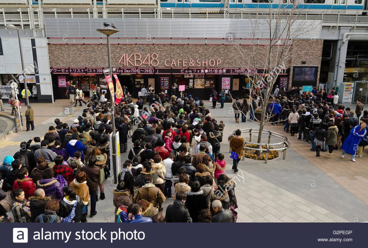 crowds of shoppers lined up outside the store before opening
